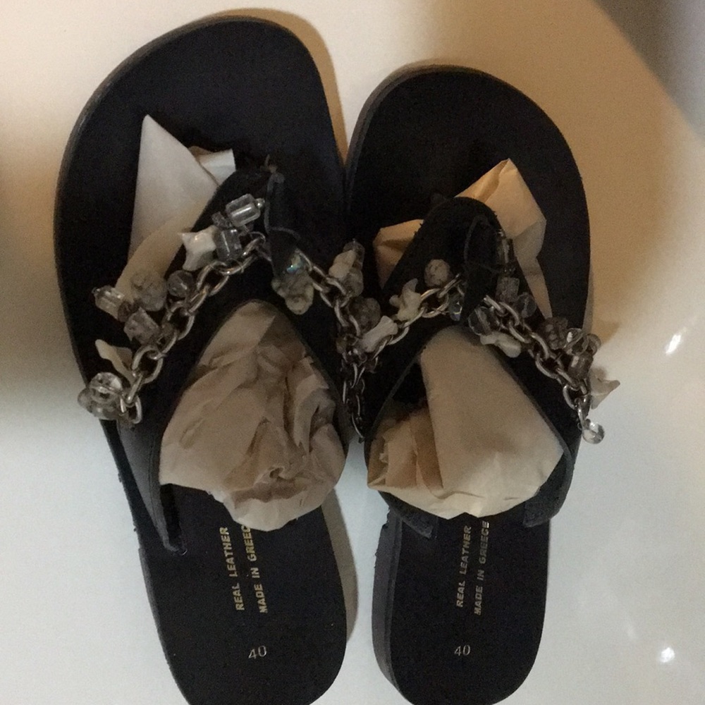 Black leather flat thong slides mules with charms